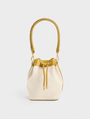 Charles & Keith Braided-Handle Drawstring Bucket Tasche Senfgelb | 175QDAUFO