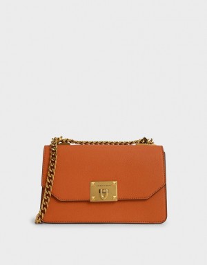 Charles & Keith Metallic Push-Lock Crossbody Taschen Orange | 354PCVRLM