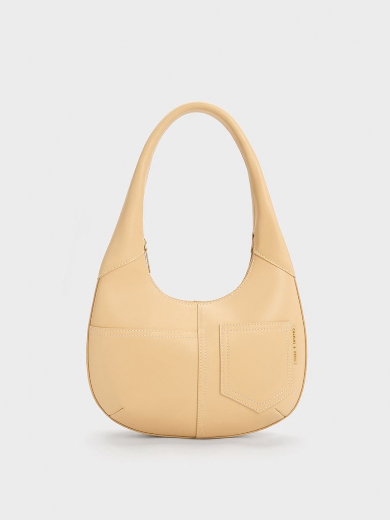 Charles & Keith Anthea Contrast-Trim Curved Hobo Tasche Beige | 325GVPLAJ