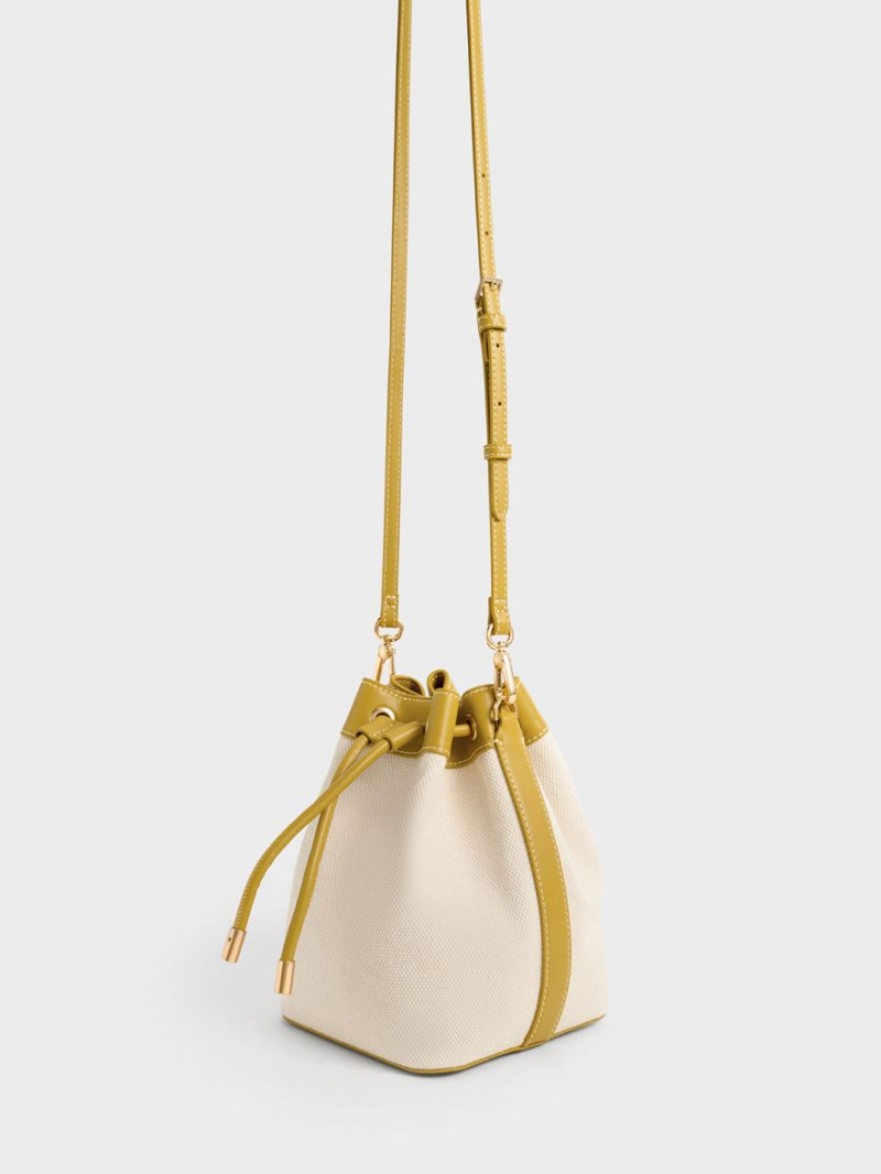 Charles & Keith Braided-Handle Drawstring Bucket Tasche Senfgelb | 175QDAUFO