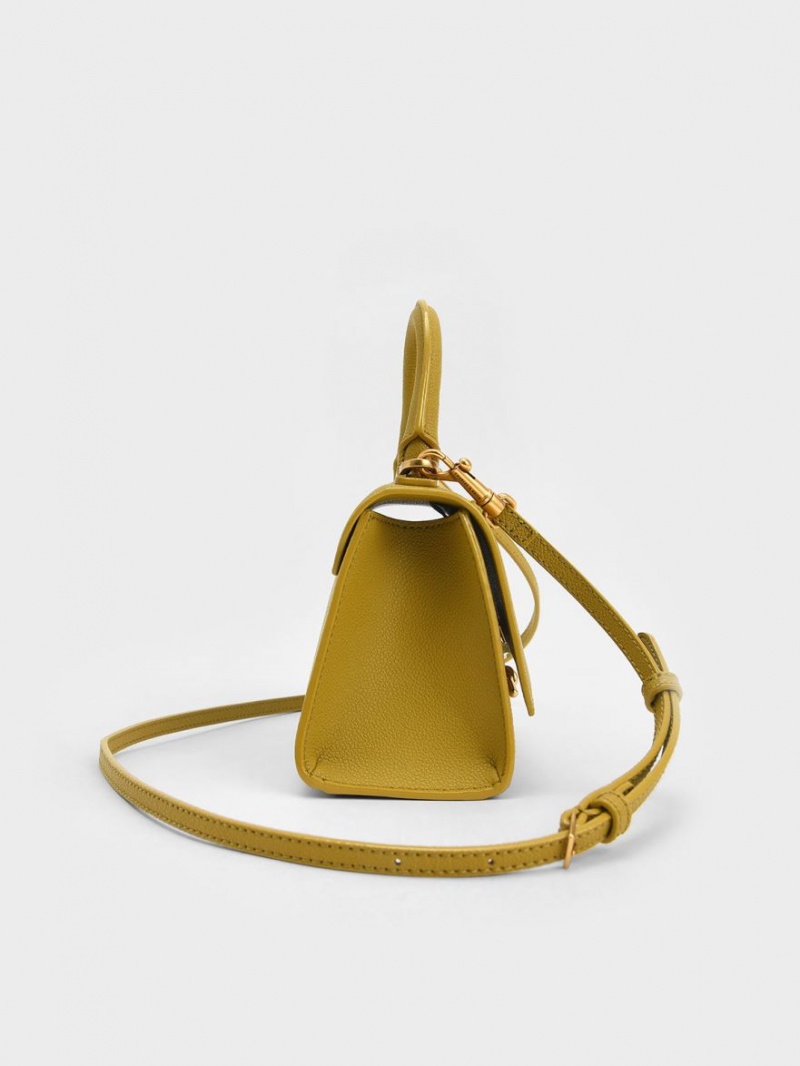 Charles & Keith Huxley Metallic Push-Lock Top Handtasche Senfgelb | 867KITADX