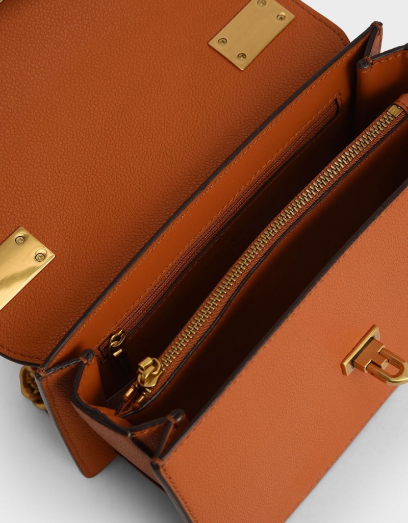 Charles & Keith Metallic Push-Lock Crossbody Taschen Orange | 354PCVRLM